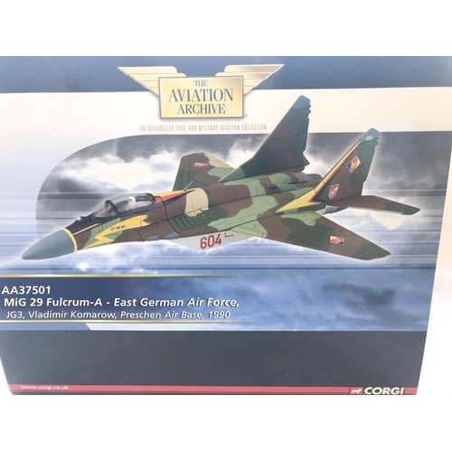 36 - 4 x Boxed Corgi Aircraft including a Thunderbolt, a Mig 29, a Harrier and a Douglas DC3. Scale 1:72