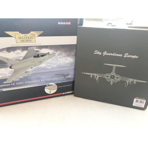 41 - A Corgi Eurofighter Typhoon # AA35405 and a Sky Guardians Gloster Javelin both boxed.