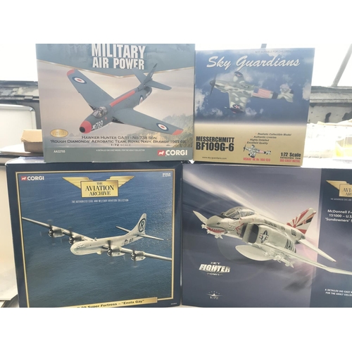 43 - 4 model Aircraft including a corgi Boeing B-29. A Corgi Phantom II. A Hawker Hunter and a Sky Guardi... 