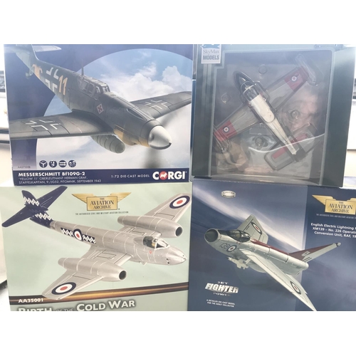 49 - A Corgi Messerschmitt #AA27102B. A Corgi Lightning #AA32303. A Corgi Gloster Meteor #AA35001 and a S... 