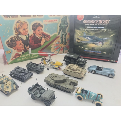 502 - A Boxed Magic Robot Game with a boxed Corgi Grumman Hellcat F6F-3 and a collection of loose diecast.