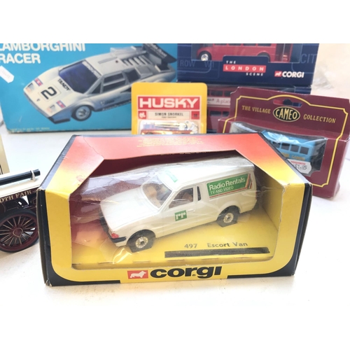 528 - A Box Containing a Radio Controlled Lamborghini. 2 x Corgi London Busses. A Corgi Escort Van #497. A... 