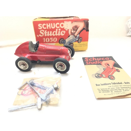 530 - A Tinplate Schuco Studio 1050 boxed and with tools.( Box is warn)