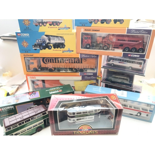 57 - A box containing a collection of boxed Corgi busses, lorry's etc.