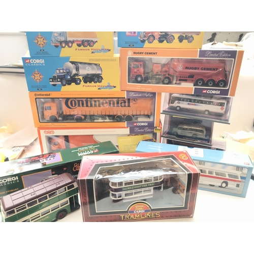 57 - A box containing a collection of boxed Corgi busses, lorry's etc.