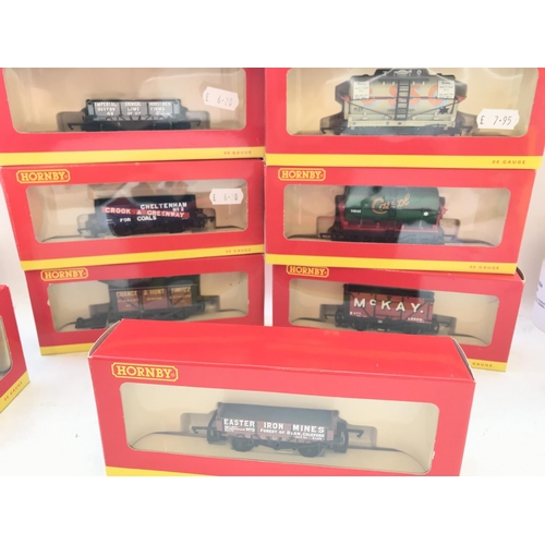 576 - 7 x Hornby boxed Rolling-stock and 3 X Hornby Coaches.