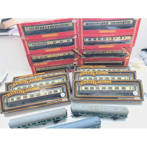 61 - A box containing a collection of Hornby and Mainline coaches all boxed. Plus 3 loose.