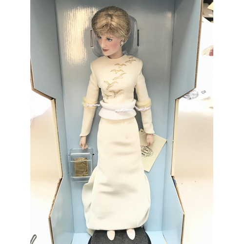 65 - A Franklin mint Princess of Wales Porcelain doll. Boxed approximately 44cm in height.