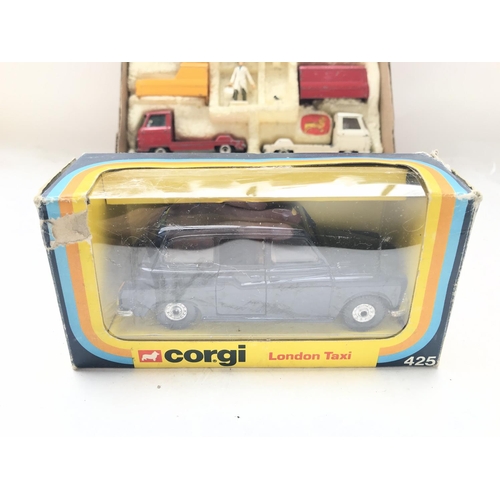 85 - A boxed Corgi London Taxi #425. A Boxed Corgi Volkswagen Pick-Up #431and a corgi Milk Set