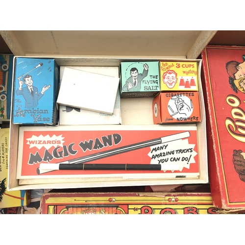 92 - A box containing a collection of Vintage games.