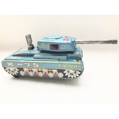 93 - A Battery operated Tin Plate Space Tank X-75.