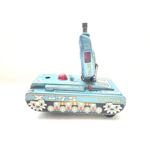 93 - A Battery operated Tin Plate Space Tank X-75.