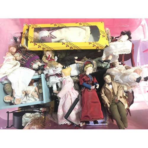 1013 - A Box Containing a Collection of Vintage Dolls and accessories.