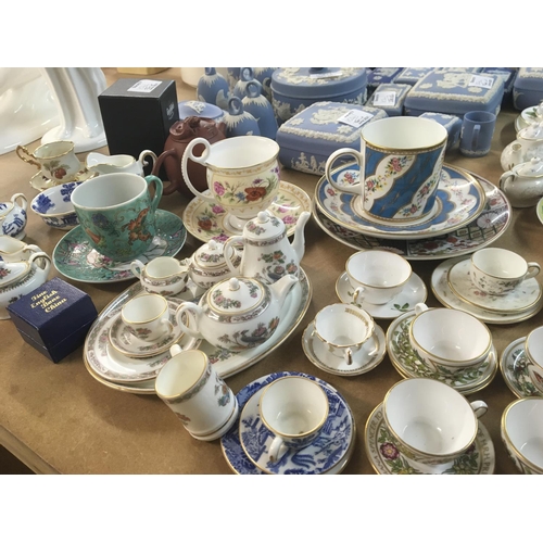 1042 - A collection of Wedgwood Jasper ware blue and white trinket boxes bells and cup and saucer and a col... 