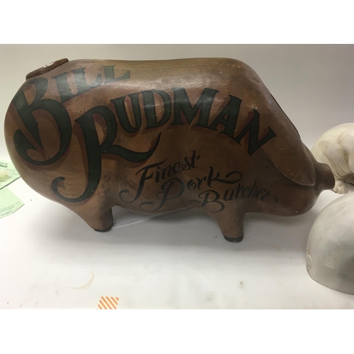 2177 - A large wooden pig, previously served as an advertisement for a butchers. In a lot with two other sm... 