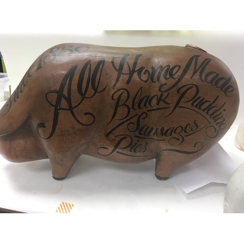 2177 - A large wooden pig, previously served as an advertisement for a butchers. In a lot with two other sm... 