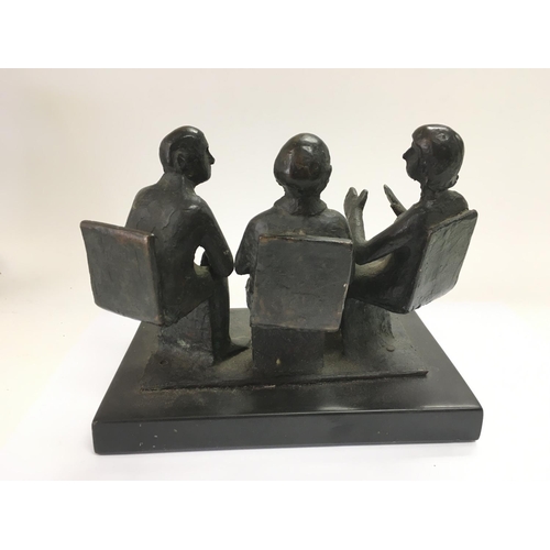 851 - Catharni Stern 1925-2015. A bronze sculptural figural group of three figures in conversation. An art... 