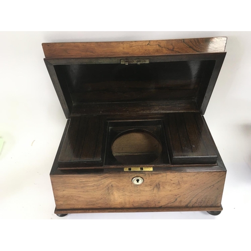 859 - A quality rosewood tea caddy.