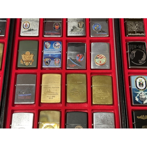 885 - A collection of 80 American military related zippo lighters 1984 onwards with a large collection of ... 