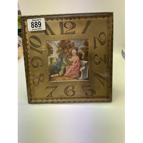 889 - A 1930s 8 day mantle clock with hand painted panel to centre.