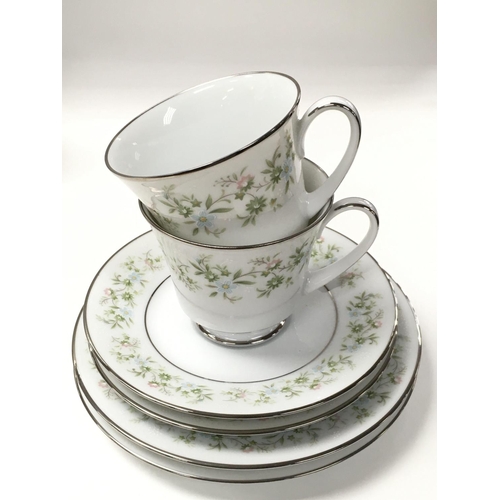 911 - Two boxes containing a Noritake Savannah 8 piece coffee set, a Royal Doulton dinner service set and ... 