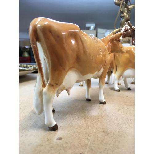 940 - Three Beswick cows and one Beswick horse - NO RESERVE