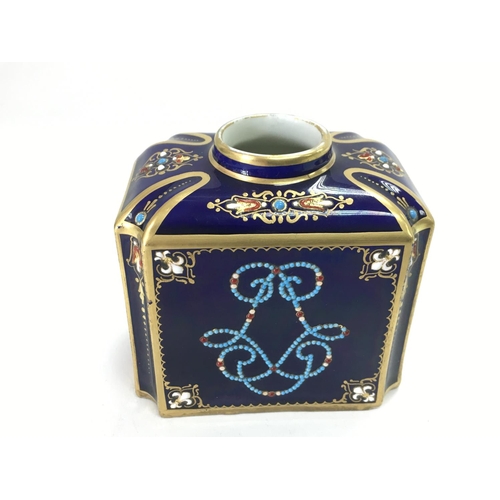 944 - A Sevres tea caddy with enamel decoration and jewelled decoration, approx height 7.5cm.