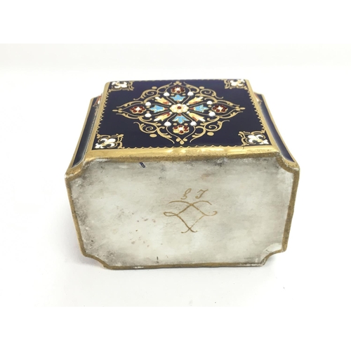 944 - A Sevres tea caddy with enamel decoration and jewelled decoration, approx height 7.5cm.