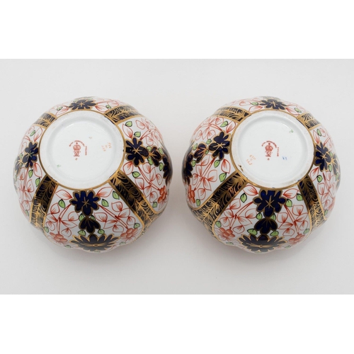 959 - A pair of Royal Crown Derby quality porcelain pot porri pattern number 1128 the Imari pattern decora... 