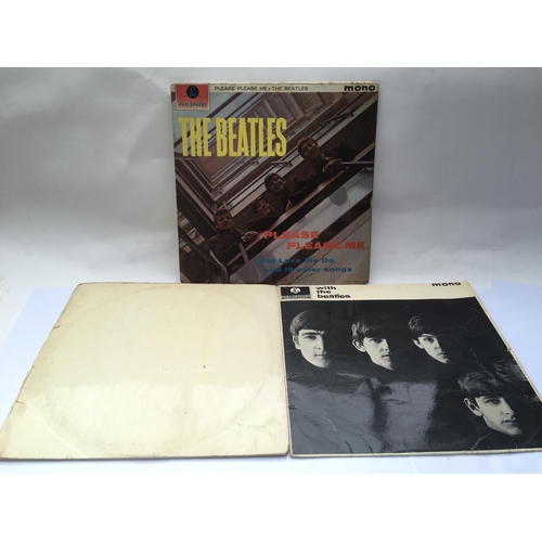 133 - Three early UK pressings of Beatles LPs comprising a numbered 'White Album' no.84976 (no poster or p... 