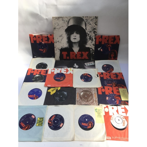 173 - A collection of T Rex 7inch singles and two LPs comprising 'The Slider' and 'Tanx'.