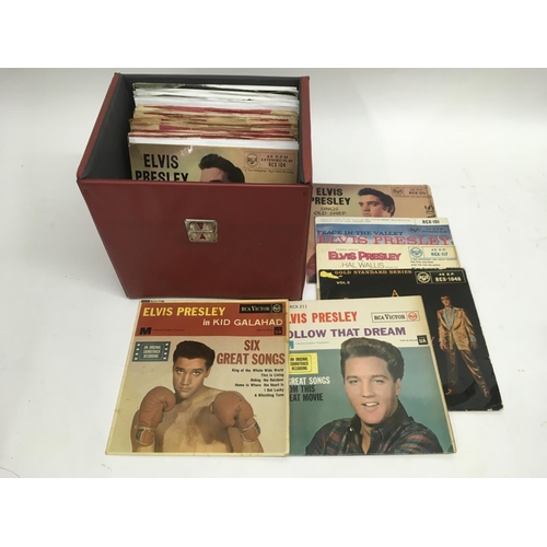 254 - A collection of Elvis Presley LPs, picture discs, EPs, 7inch singles and Elvis monthly magazines.