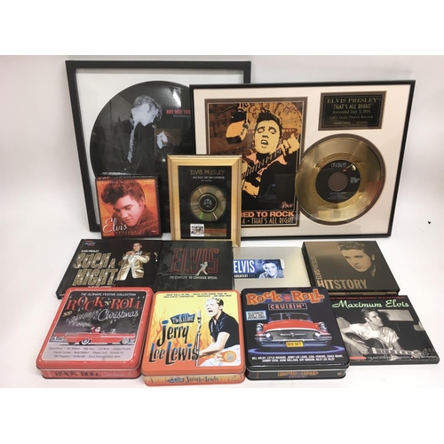 311 - A framed limited edition Elvis Presley gold disc, framed picture disc and various Elvis and rock n r... 