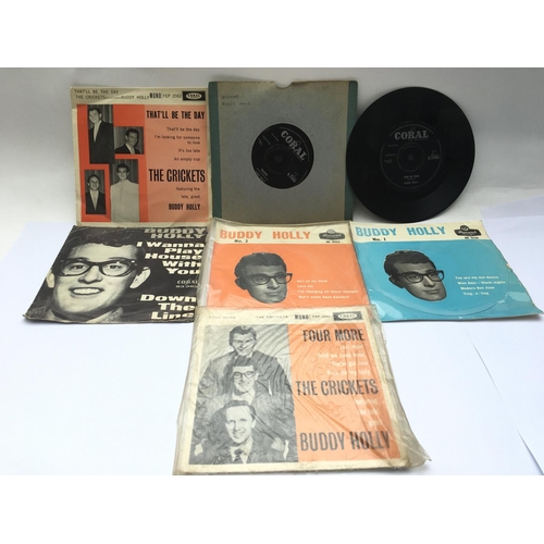 40 - Four Buddy Holly EPs and three 7inch singles.