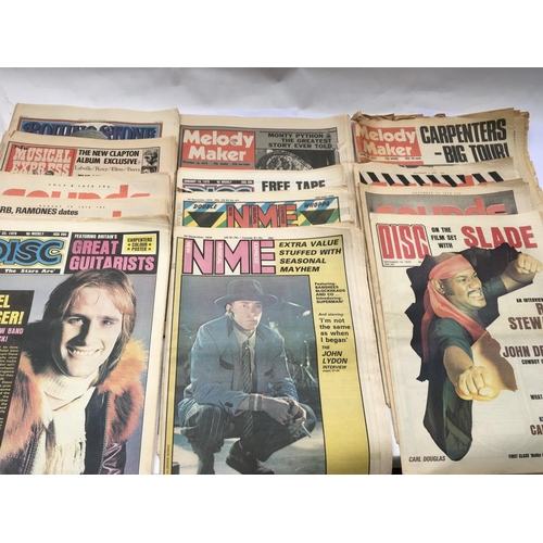 533 - A collection of vintage music papers and magazines comprising NME, Melody Maker, Sounds and others.