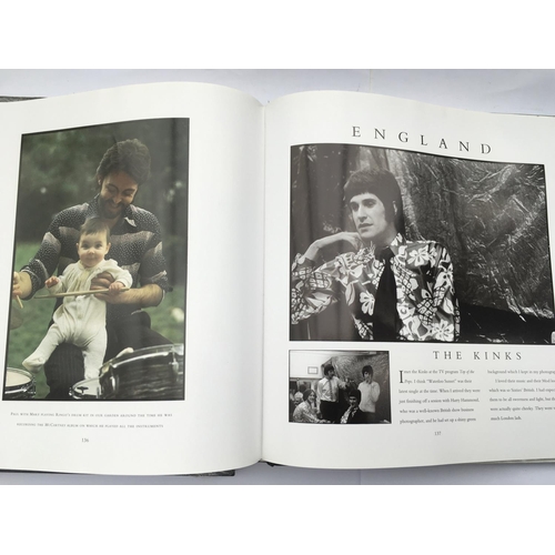 534 - Two coffee table books comprising a Linda McCartney 'Sixties Portrait Of An Era' hardback book toget... 