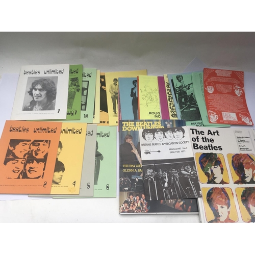 537 - A box of Beatles fanzines, Anthology videos, CDs etc.