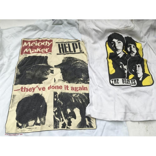 541 - A collection of vintage Beatles t-shirts and sweatshirt.