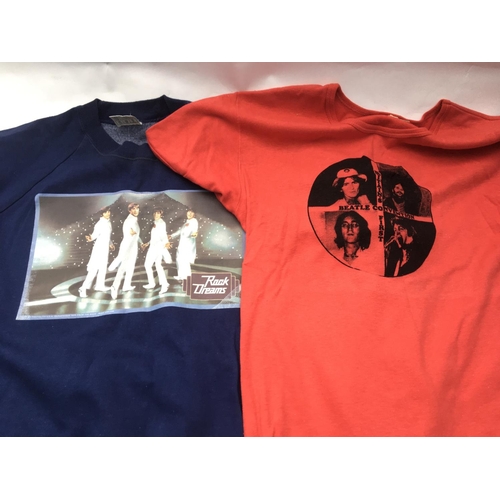 541 - A collection of vintage Beatles t-shirts and sweatshirt.