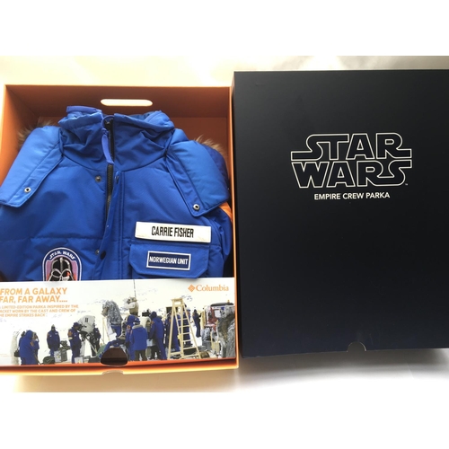 563 - A boxed and as new Star Wars empire crew parka jacket. Size extra small with customised Carrie Fishe... 