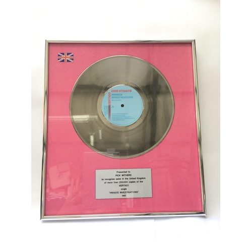 617 - A framed and glazed silver disc presented to Dire Straits' drummer Pick Withers for recognition of m... 