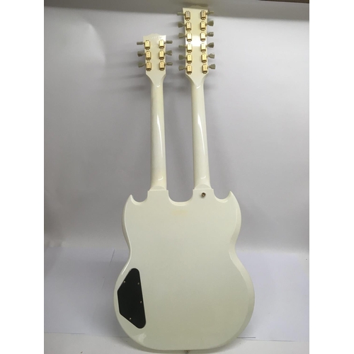 701 - A Gibson double neck 6 and 12 string electric guitar in white with a black scratchplate and gold pla... 