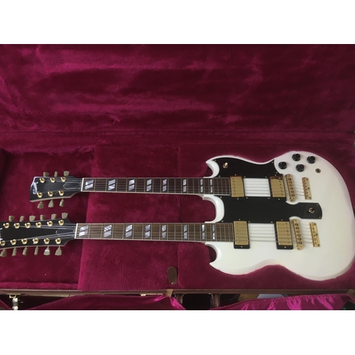 701 - A Gibson double neck 6 and 12 string electric guitar in white with a black scratchplate and gold pla... 