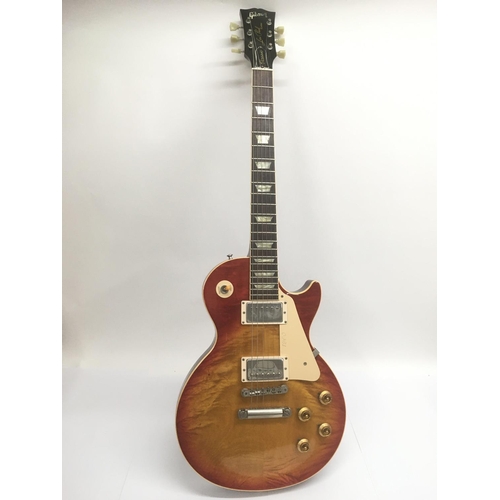 702 - A Gibson Les Paul 1960 reissue Classic plus electric guitar. Serial number 4 1419. In a lovely condi... 