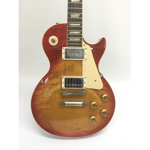 702 - A Gibson Les Paul 1960 reissue Classic plus electric guitar. Serial number 4 1419. In a lovely condi... 