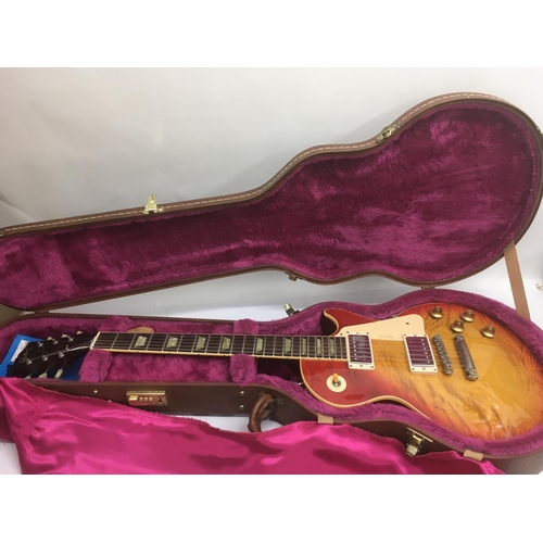 702 - A Gibson Les Paul 1960 reissue Classic plus electric guitar. Serial number 4 1419. In a lovely condi... 