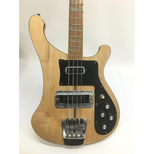 703 - A vintage Rickenbacker 4001 bass guitar in mapleglo with black scratchplate and name plate. Serial l... 