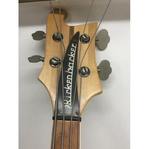 703 - A vintage Rickenbacker 4001 bass guitar in mapleglo with black scratchplate and name plate. Serial l... 