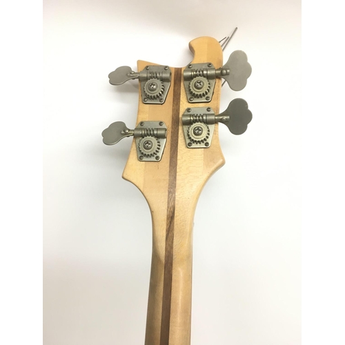 703 - A vintage Rickenbacker 4001 bass guitar in mapleglo with black scratchplate and name plate. Serial l... 