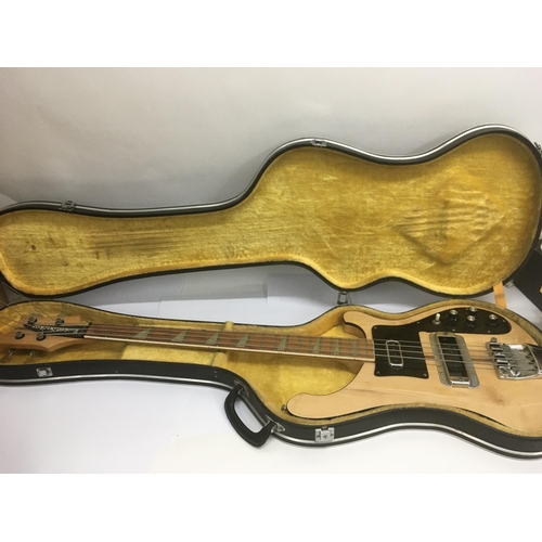 703 - A vintage Rickenbacker 4001 bass guitar in mapleglo with black scratchplate and name plate. Serial l... 